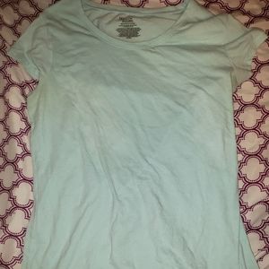 A light baby blue tee